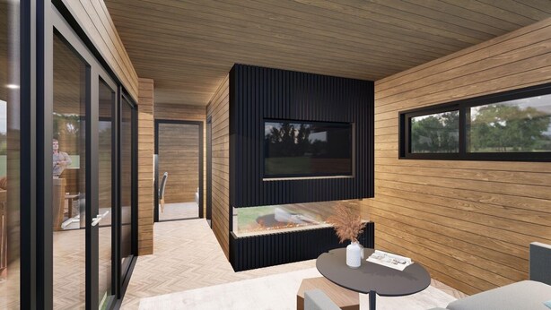 A modern interior with a fireplace, wooden walls, and large windows. - Luxury lodges with views of Lancashire rolling hills & our beautiful golf course (Staining)