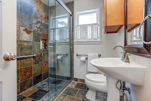Shower, hair dryer, towels, soap