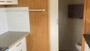 Shower, towels, soap, toilet paper