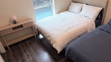 Coffres-forts dans les chambres, fer et planche à repasser