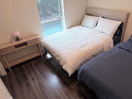 Deluxe Apartment, Garden View | Egyptian cotton sheets, premium bedding, memory foam beds, in-room safe