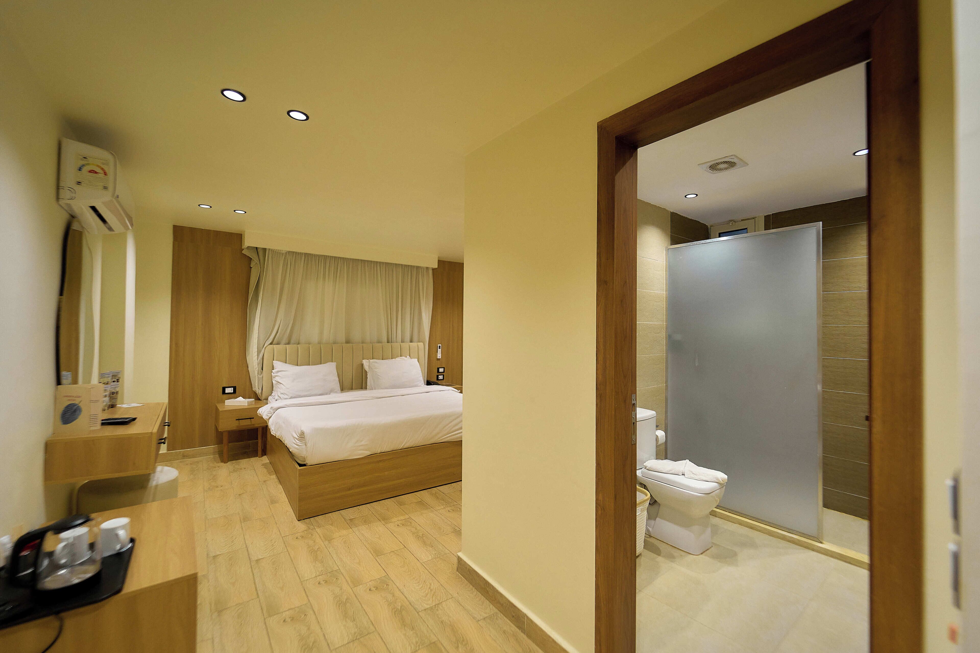 ห้องดีลักซ์ดับเบิล | เครื่องนอนระดับพรีเมียม, ผ้านวมขนเป็ด, เตียงพร้อมฟูกเสริมที่นอน