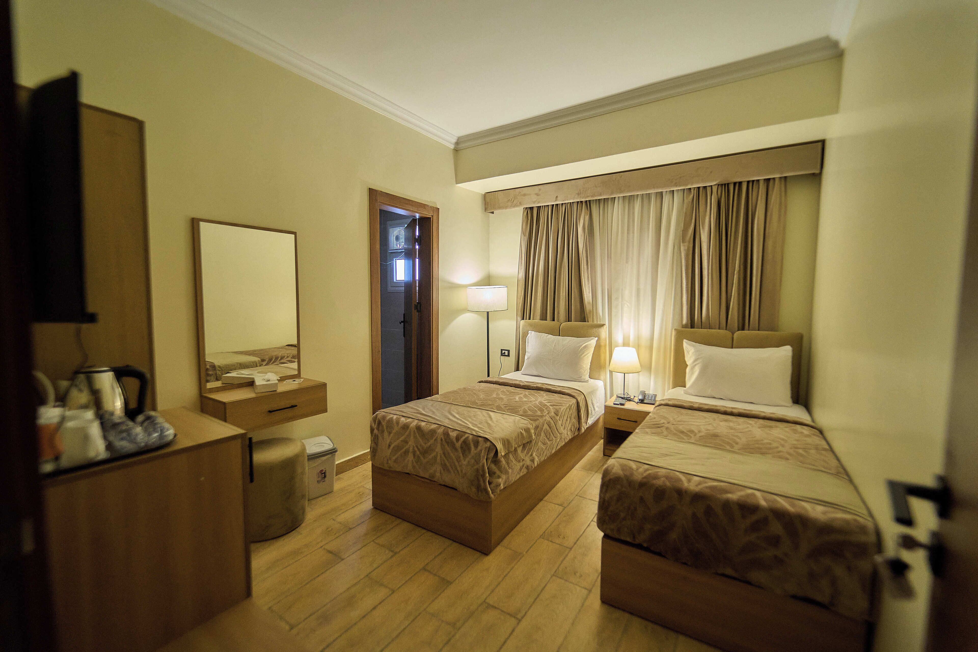 Comfort Twin Room, Garden View | In-room safe, blackout drapes, soundproofing, free WiFi