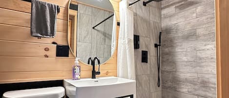 Shower, towels, soap, toilet paper