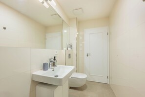 Hair dryer, towels, soap, shampoo