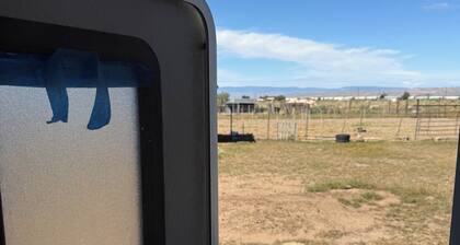 Cozy 2-bedroom RV in enchanting Carrizozo with AC on 5.5 acres!