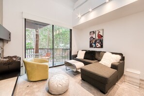 TV, fireplace - River Run # 15 by Tahoe Getaways - 2 BR w Ski Shuttle - River View (Alpine Meadows)