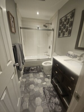 Hair dryer, towels, soap, shampoo