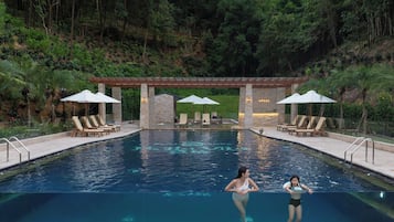 Outdoor pool, open 8:30 AM to 8:00 PM, pool loungers