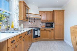 Microwave, dishwasher, toaster, cookware/dishes/utensils