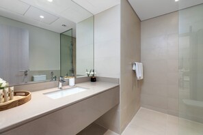 Deluxe Apartment, Non Smoking, Canal View | Bathroom | Shower, free toiletries, bidet, soap - Maison Privee - Sleek Yas Getaway w/ Ferrari World and Canal Views (Abu Dhabi)