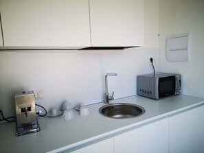 Fridge, microwave, dining tables