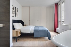 2 chambres, fer et planche à repasser, Wi-Fi, draps fournis