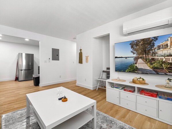 Signature Apartment, City View | Living area | 65-inch Smart TV with digital channels, streaming services - Casitas en Pueblo - Central Lofts (Pueblo)