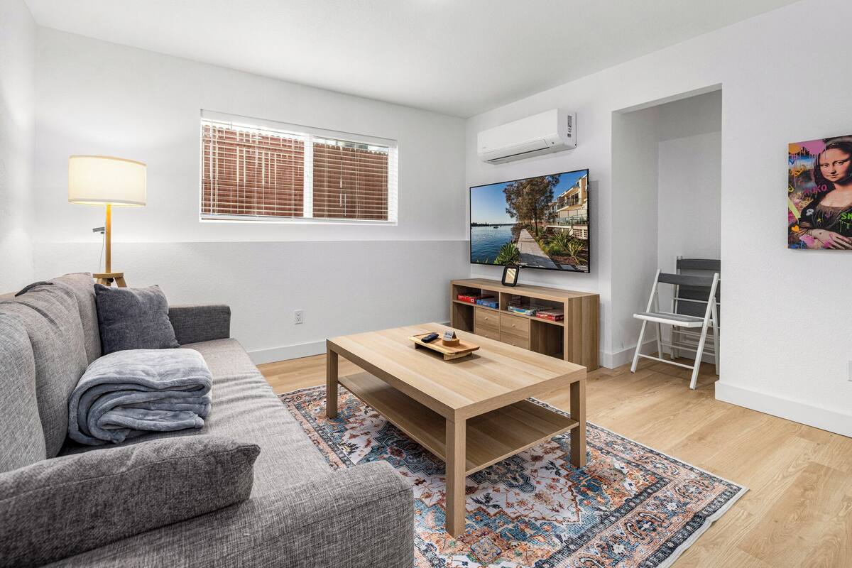 Apartamento conforto, vista para a cidade | Área de estar