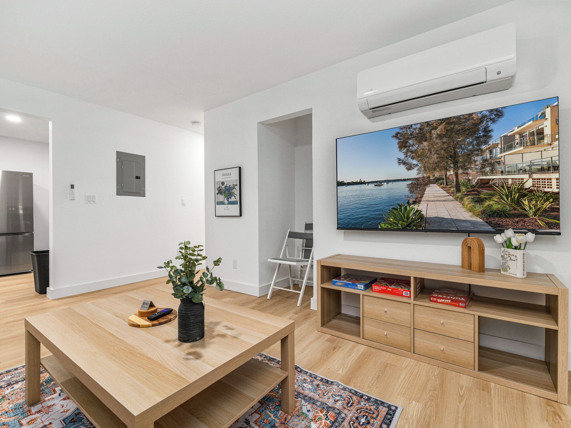 Design Apartment, City View | Living area | 65-inch Smart TV with digital channels, streaming services