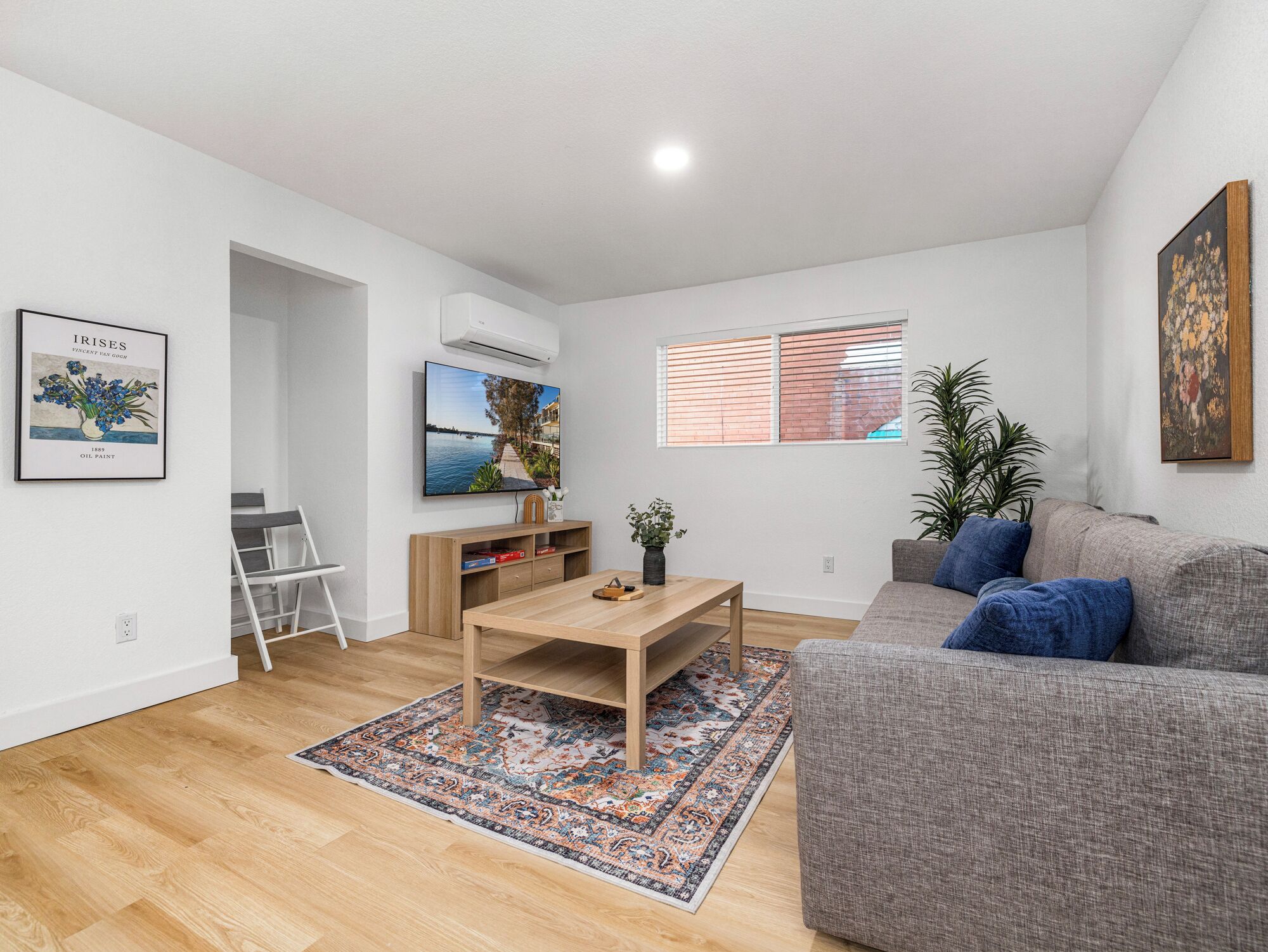 Design Apartment, City View | Living area | 65-inch Smart TV with digital channels, streaming services