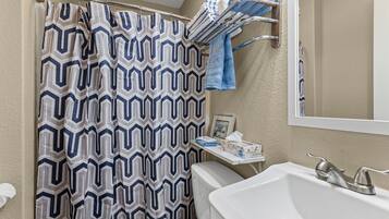 Hair dryer, towels, soap, shampoo