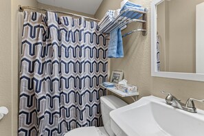 Hair dryer, towels, soap, shampoo