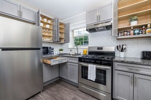 Fridge, microwave, stovetop, coffee/tea maker