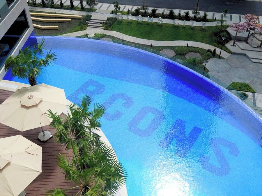 Outdoor pool, open 6:00 AM to 8:00 PM, pool umbrellas