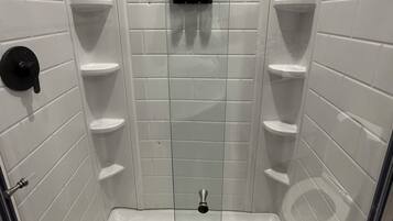 Shower, towels, soap, shampoo