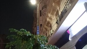A building with ornate architectural details and a balcony. - New Panorama Inn (Cairo)