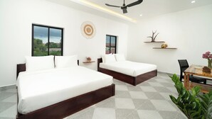 A modern hotel room with two beds, a ceiling fan, a large window, and a view of greenery. - Visak Pool Villa  (Siem Reap)
