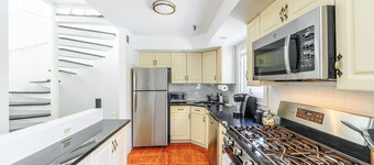 Modern 3BR Townhouse with Private Rooftop & Parking Minutes to NYC