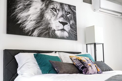 Modern 3BR Townhouse with Private Rooftop & Parking Minutes to NYC