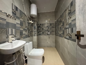 Shower, towels, soap, shampoo