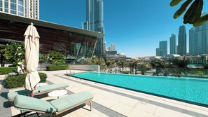 2 outdoor pools, open 7:00 AM to 10:00 PM, free cabanas, pool umbrellas - Grande Suites by Hostiva - Burj View (Dubai)