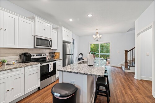 Peaceful 4BR Home w/ Porch, Deck & Wooded Views Perfect for Families and Friends