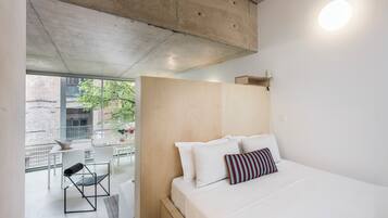 Economy Studio, Balcony, City View | Laptop workspace, blackout drapes, soundproofing, WiFi (free)
