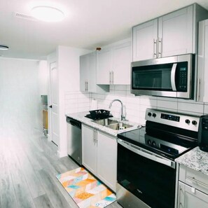 Private kitchen - Starlight Haven: Modern 2-Bedroom Suite, Private Entry near Shopping & Dining (Calgary)