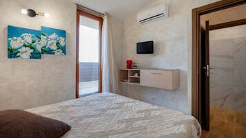 1 slaapkamer, een strijkplank/strijkijzer, wifi, beddengoed