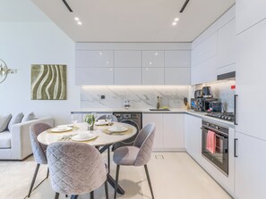 Appartement Deluxe, balcon, vue ville | Cuisine privée