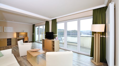Spacious double suite with balcony and lake view