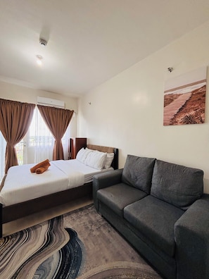Room, 1 Bedroom, Balcony | 1 bedroom - Room-contemporary City Suite With Relaxi (Iloilo)