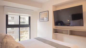 2 habitaciones, tabla de planchar con plancha y ropa de cama