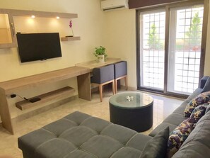 Chambre Double Luxe | Coin séjour