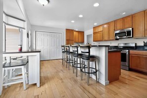 Fridge, microwave, oven, stovetop - Grass Lake Retreat with Game Room & Fire Pit (Grass Lake)