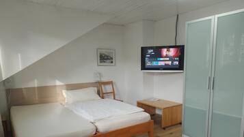 2 habitaciones, insonorización, tabla de planchar con plancha y wifi