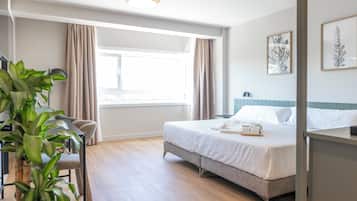 Superior kamer, 1 twee- of 2 eenpersoonsbedden, uitzicht op tuin | Een kluis op de kamer, gratis wifi