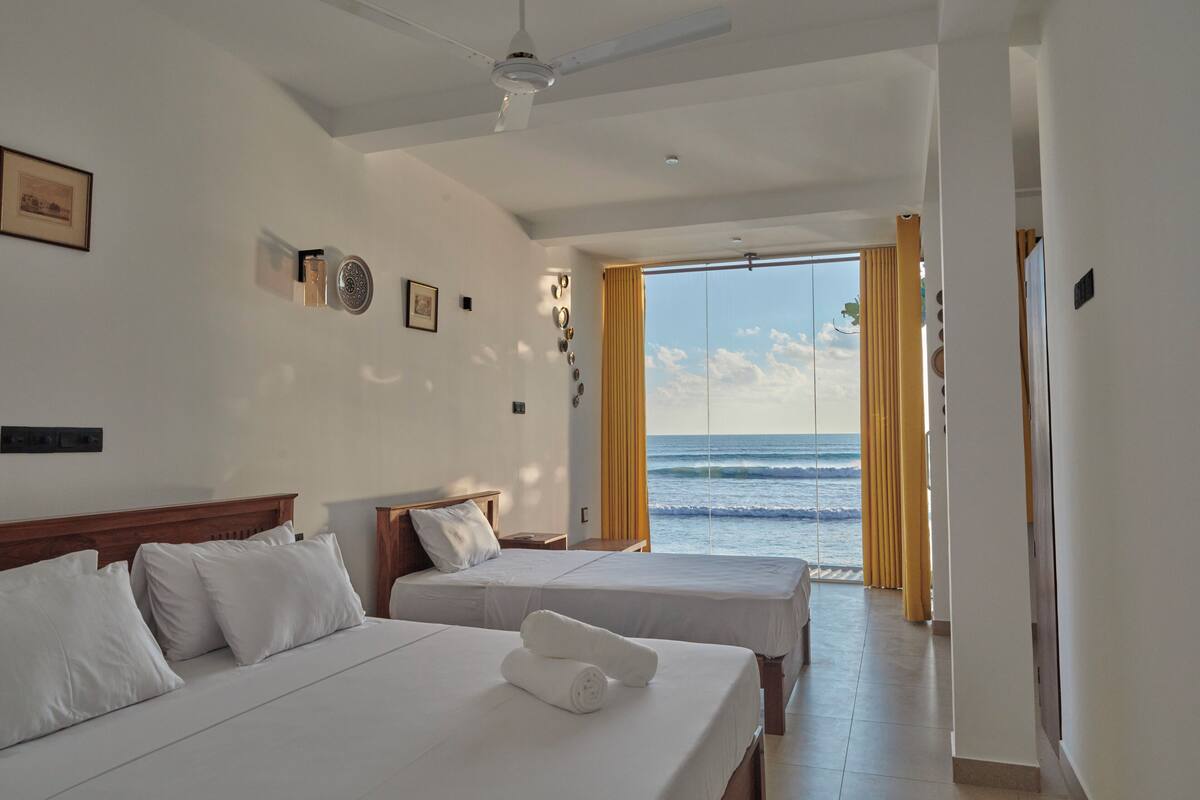 Standard Triple Room, Balcony, Sea View | Iron/ironing board (on request), WiFi (free)