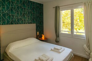 1 chambre, fer et planche à repasser, Wi-Fi gratuit, draps fournis