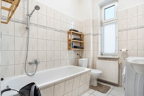 Shower, hair dryer, towels