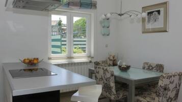 Apartment (Three Bedroom Apartment A4+2) | Living room | 32-inch flat-screen TV with satellite channels