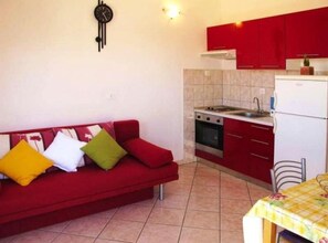 Apartment (One Bedroom Apartment A3) | Living room | 32-inch flat-screen TV with satellite channels
