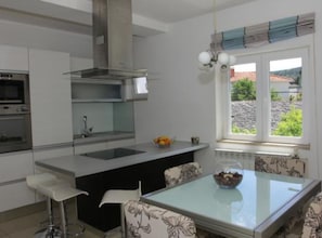 Apartment (Three Bedroom Apartment A4+2) | Living room | 32-inch flat-screen TV with satellite channels